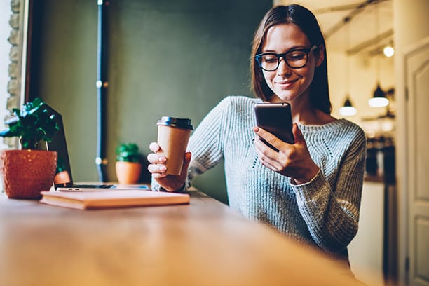 Women using phone for protection from e-commerce fraud