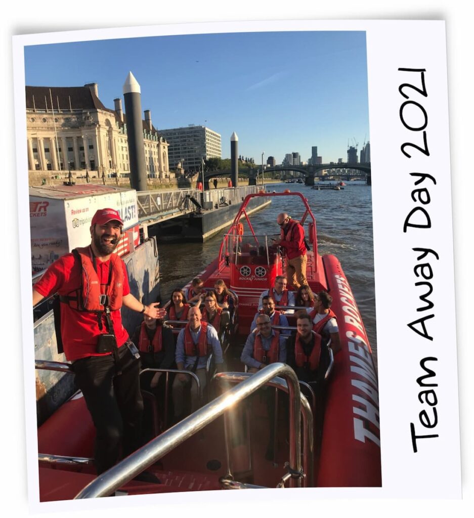 Team building day in a boat on a river